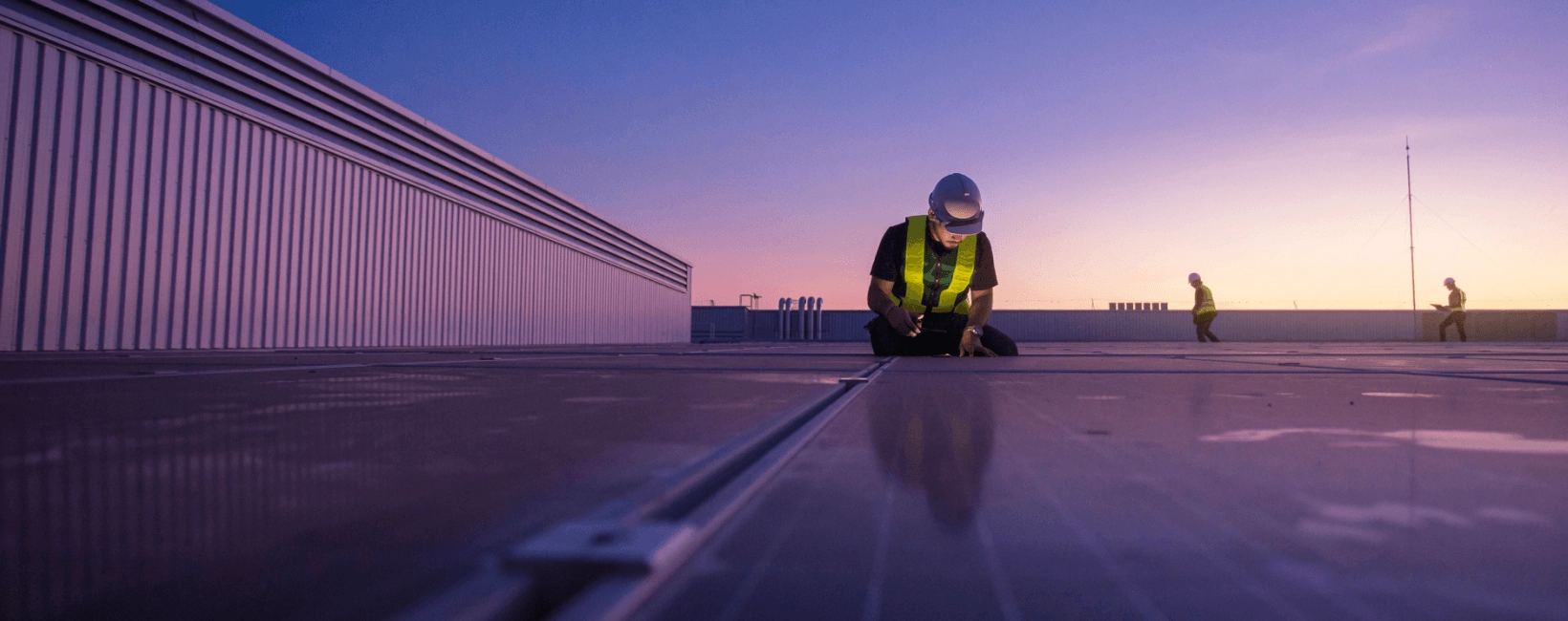 Engineer working at sunset