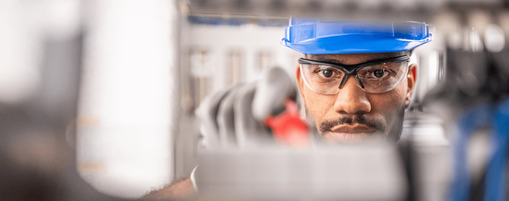 Image showing a worker fixing a meter