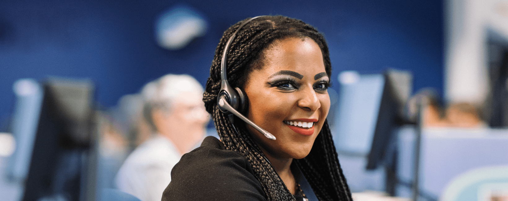 Smiling woman in office