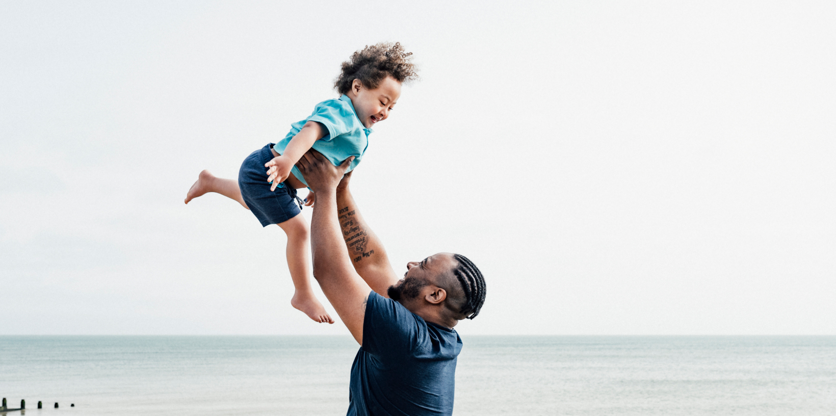 Father holding child