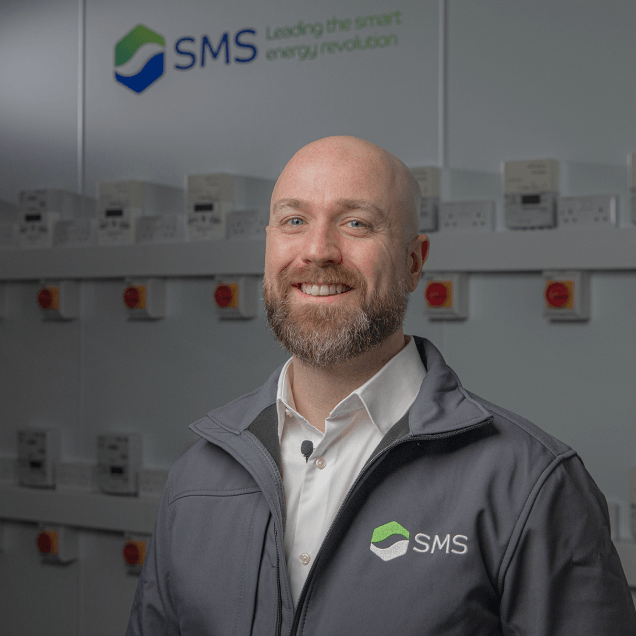 Smiling SMS worker
