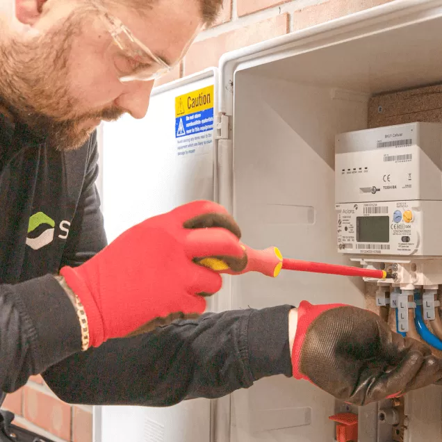 SMS engineer fixing a meter
