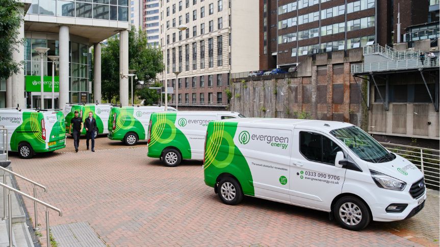 Vans parked outside a building